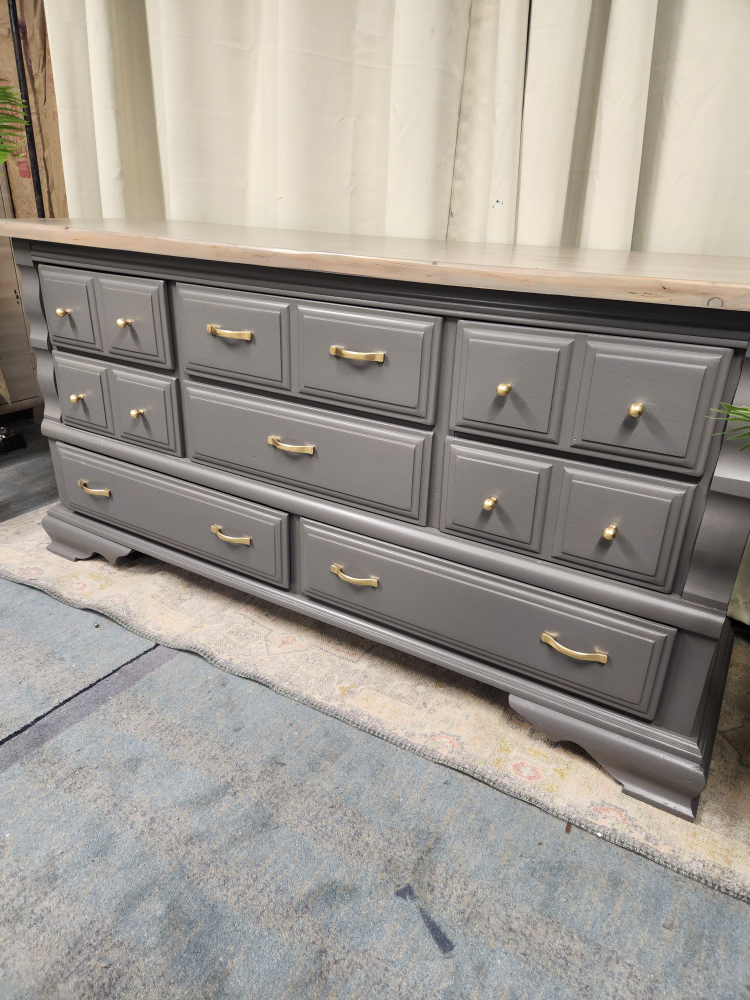 Gray dresser with light wood top