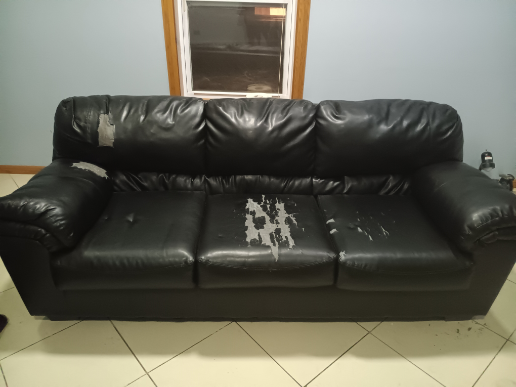 Black Leather Sofa - Needs TLC