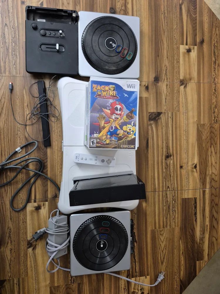 Wii console with games and accessories thumbnail