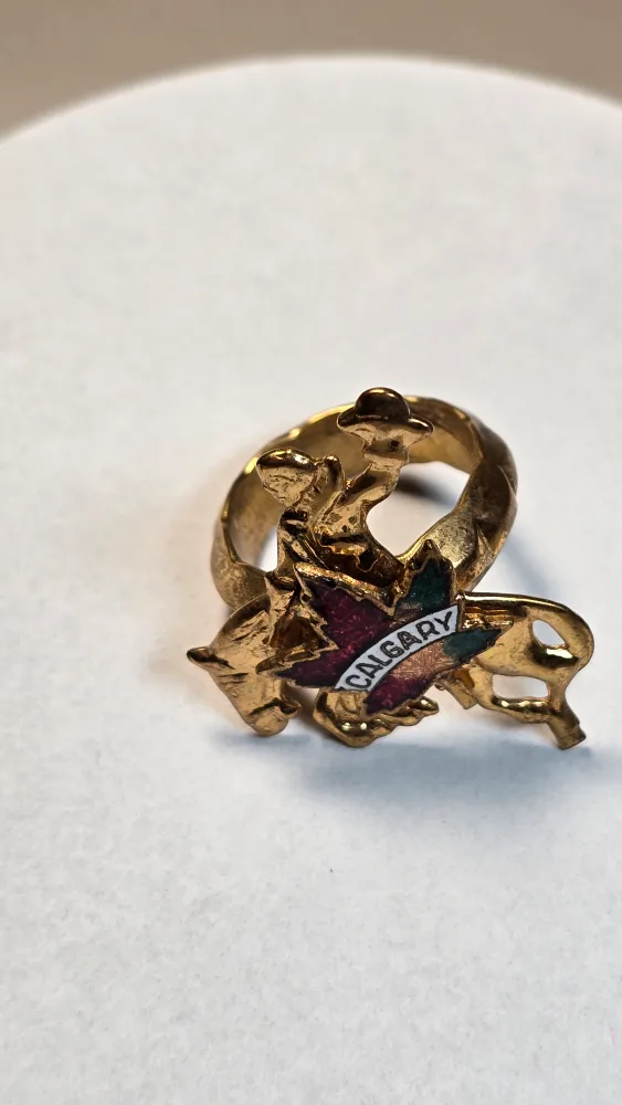 Vintage Calgary Rodeo Rider Bolo ring with Enamel Maple image indicator(2)