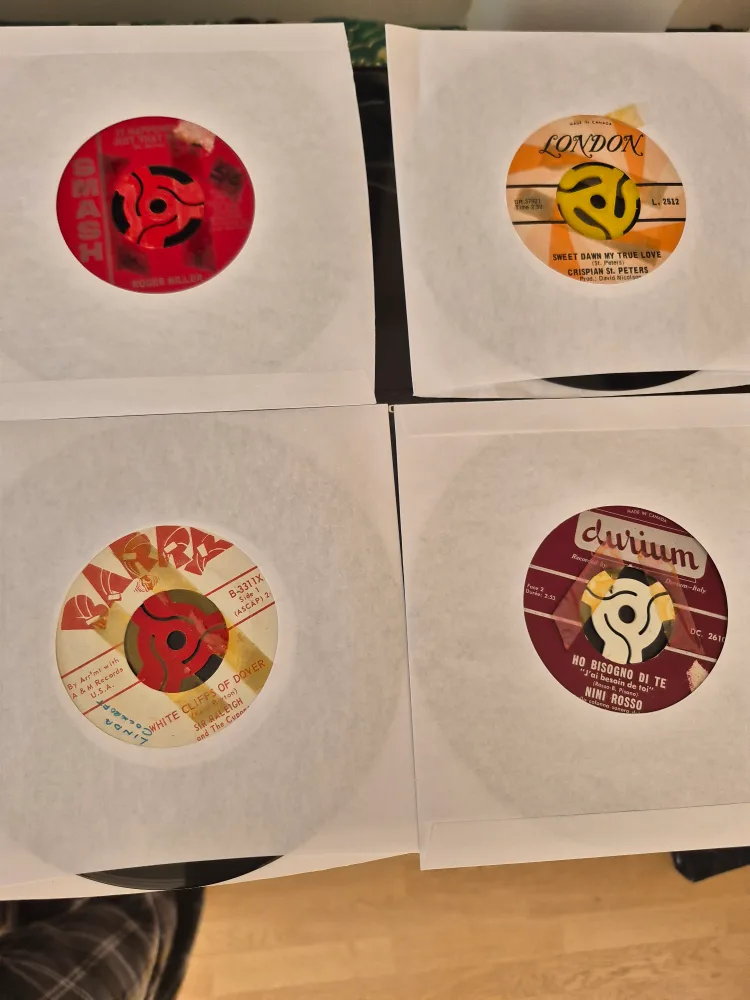 Collection of 12 Vintage 45 RPM Records image indicator(3)