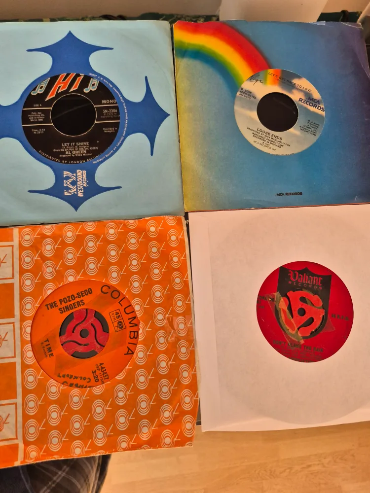 Collection of 12 Vintage 45 RPM Records image indicator(5)
