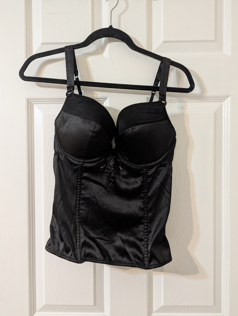 Three Corsets: Animal Print, Black Satin, and Black Lace