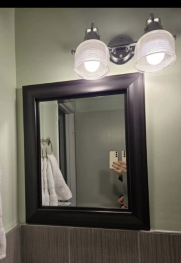Dark brown framed  mirror.Like new