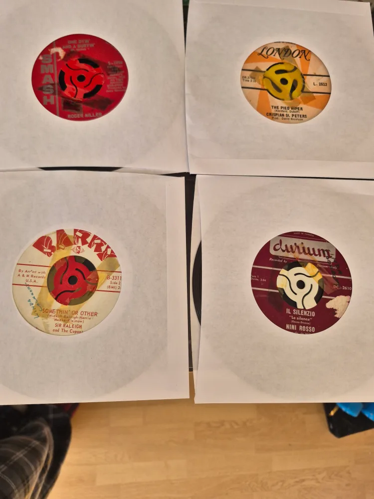 Collection of 12 Vintage 45 RPM Records image indicator(2)