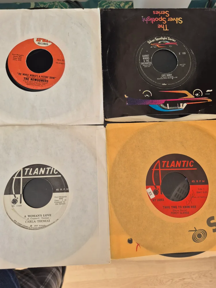 Collection of 12 Vintage 45 RPM Records image indicator(9)