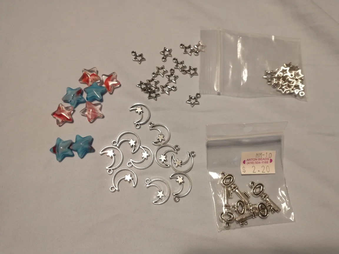 Large assortment of charms and pendants for jewellery making image indicator(3)