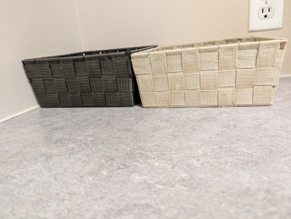 Two Woven Storage Baskets