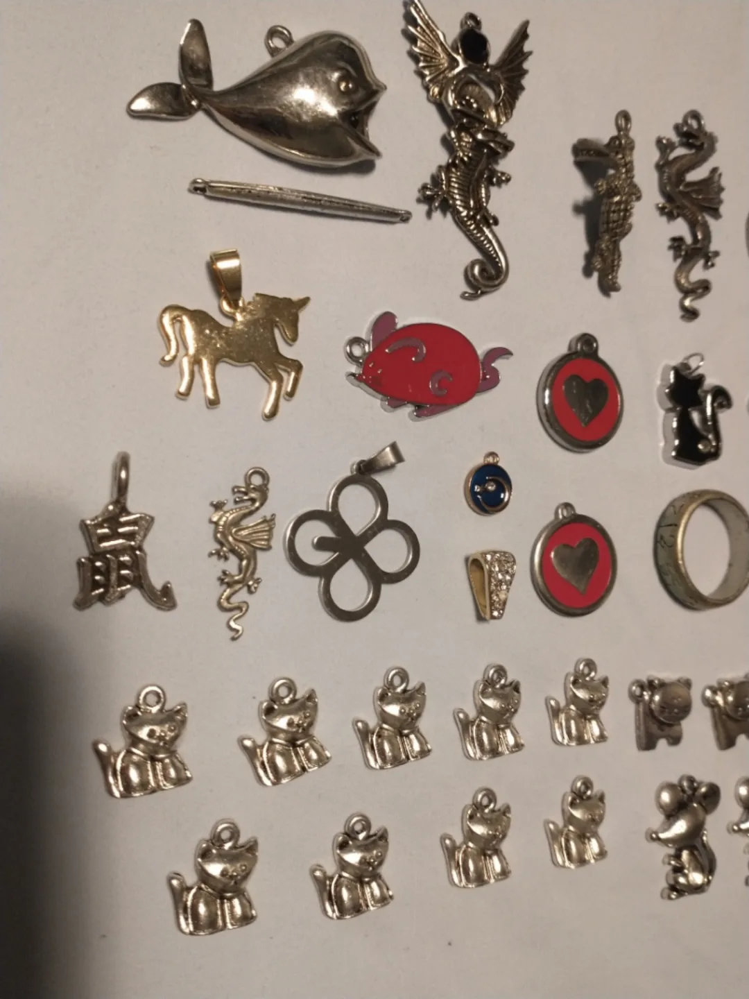 Large assortment of charms and pendants for jewellery making image indicator(4)