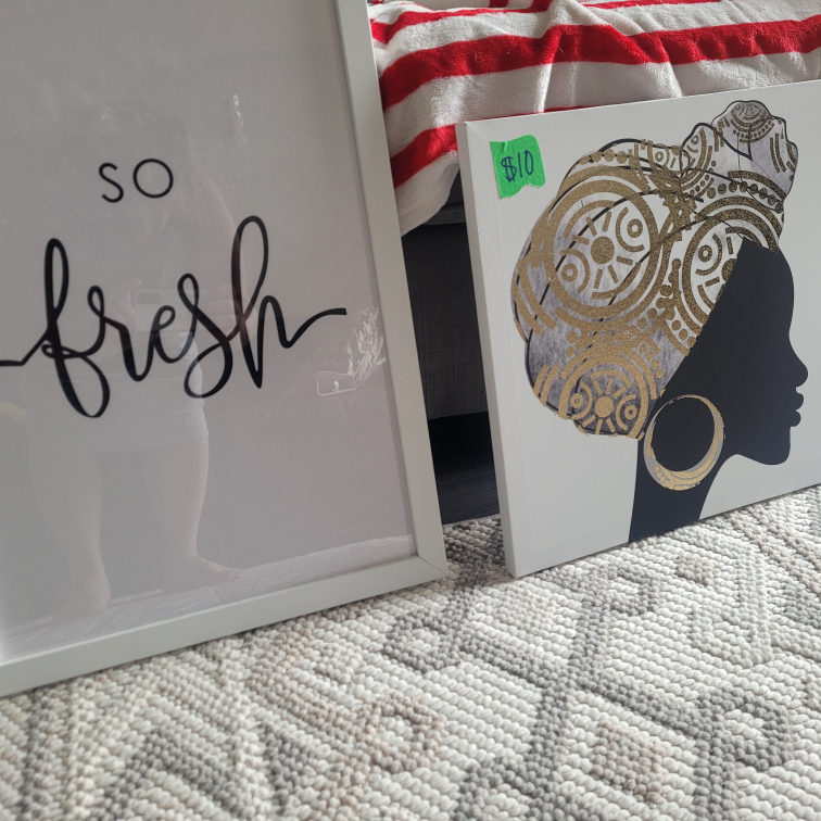 Two framed wall art prints