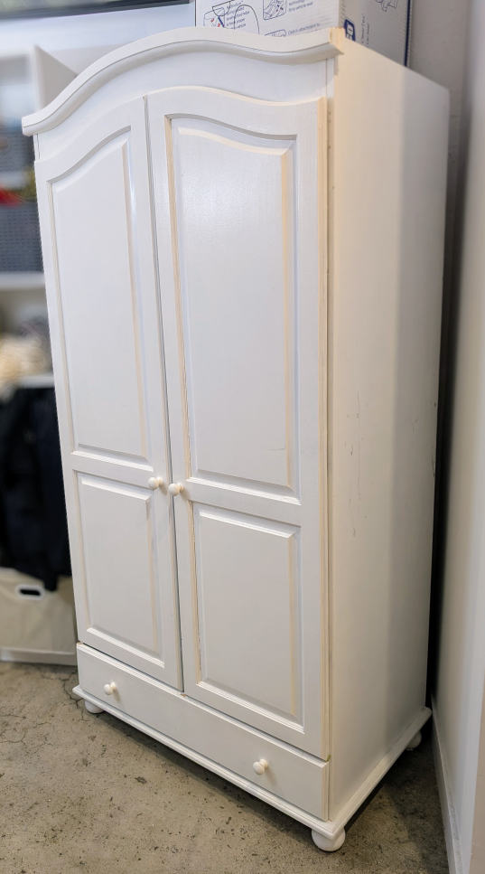 White Wooden Armoire with Hanging Rod and Drawer