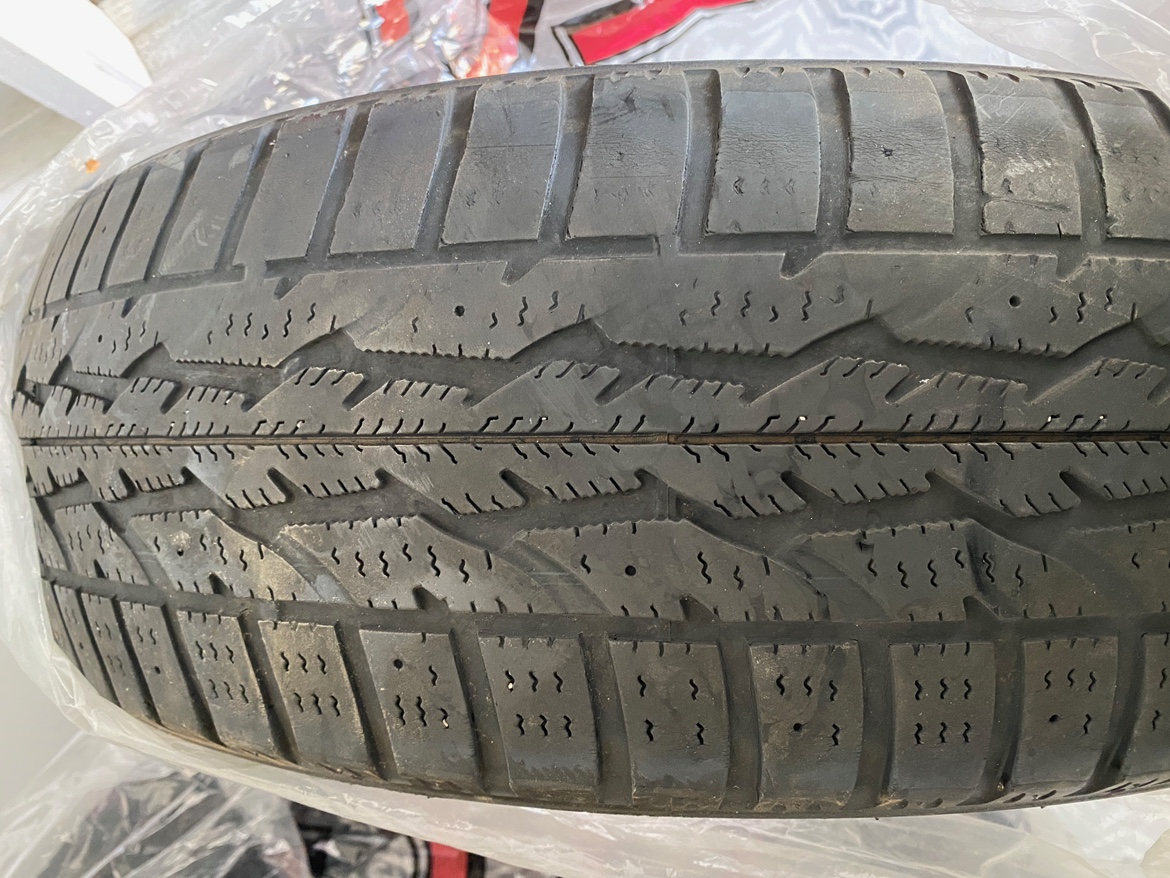 lightly used Firestone Winterforce 215/60R16 Winter Tires
