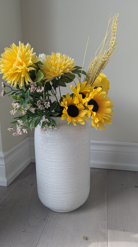 White Textured Ceramic Vase with vibrant flowers
