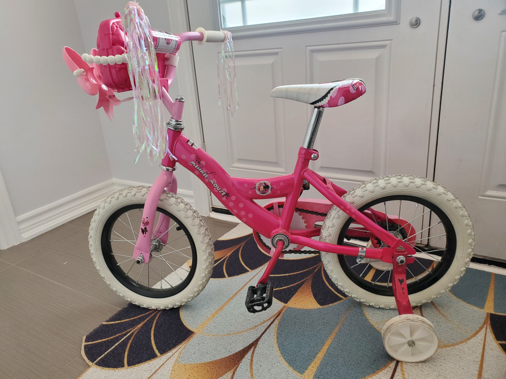 Girls bicycle and helmet