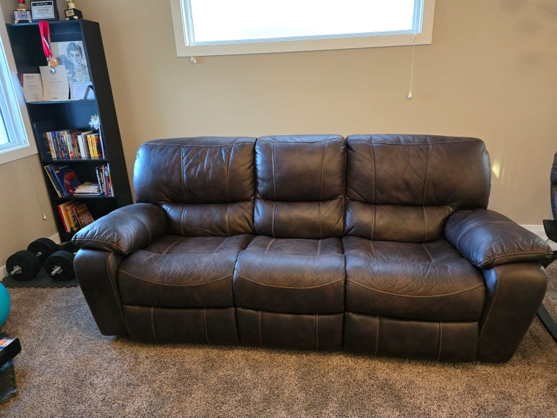 Very comfortable Brown Leather Reclining Sofa