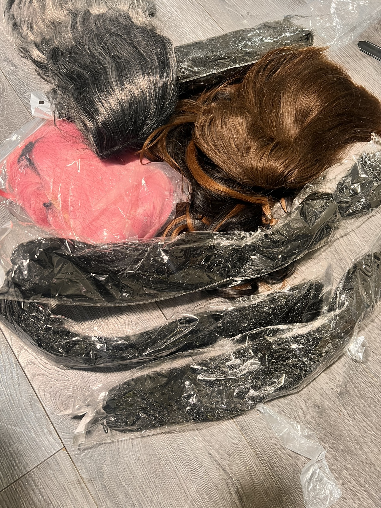 Three Wigs and 5 Hair Extensions