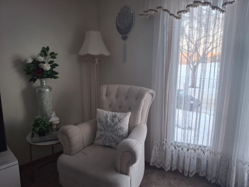 Elegant Accent Chair with Snowflake Pillow