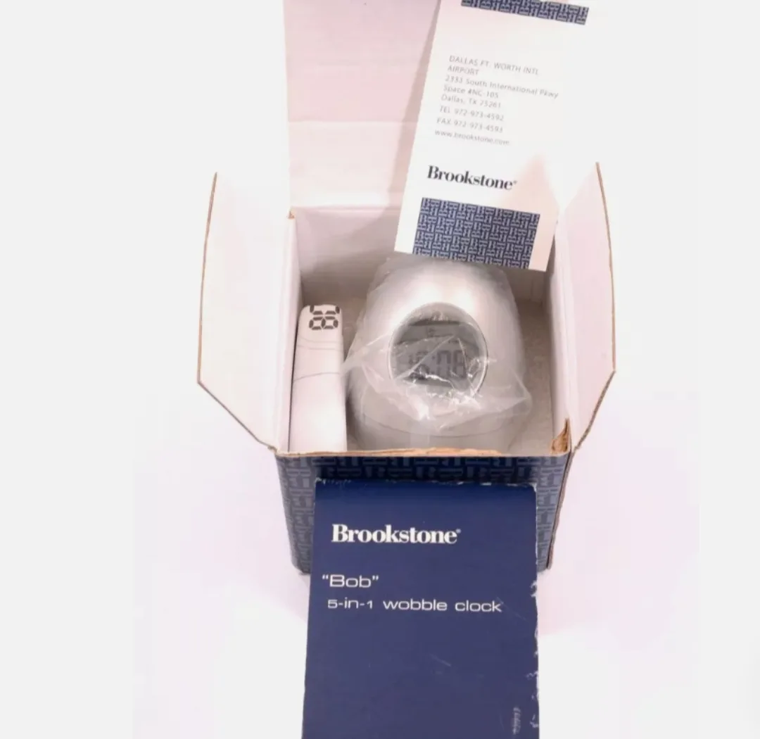 Brookstone "Bob" 5-in-1 Wobble Clock image indicator(2)