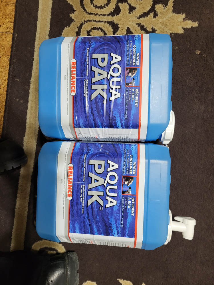 Two Reliance Aqua-Pak Water Containers with Spigots