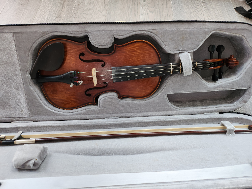 children violin and case and bow