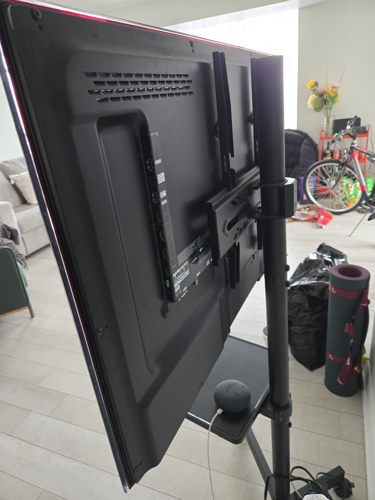 Samsung TV on rolling stand - photo 3