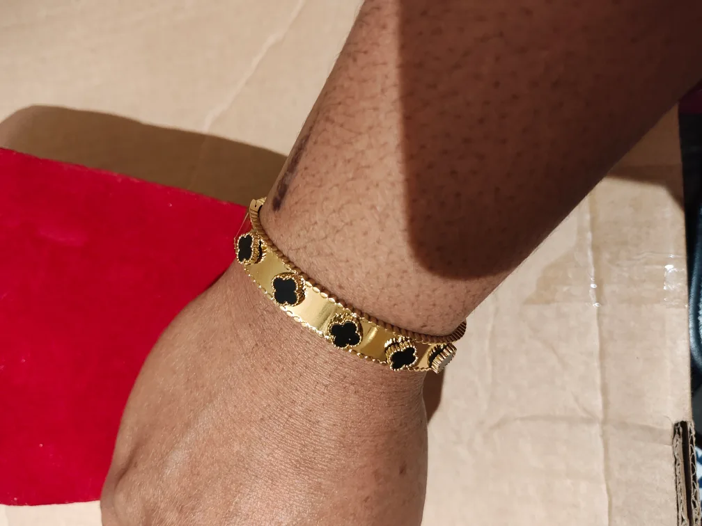 Gold Bracelet with Black Clover Motifs image indicator(4)
