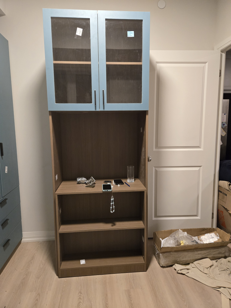 Assembled pull out desk with hutch.
