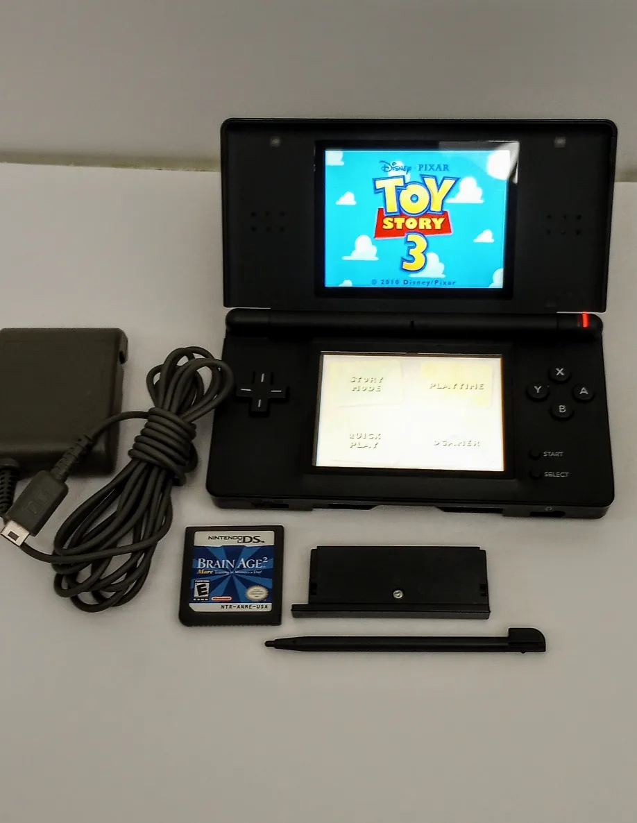 Nintendo DS lite, Onyx black w/ Stylus, Charger + 2 game carts image indicator(2)