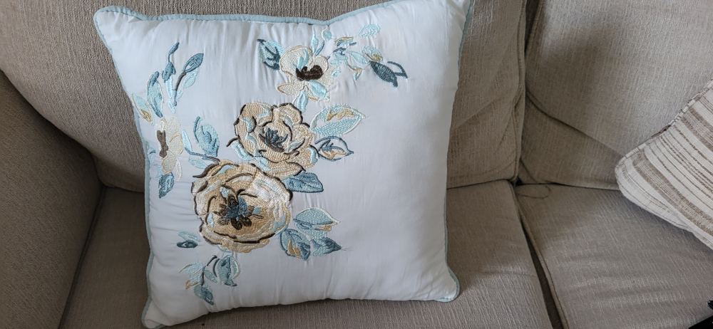 embroidered throw pillow