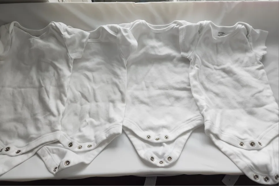 4 White Bodysuits- 3-6 months image indicator(2)