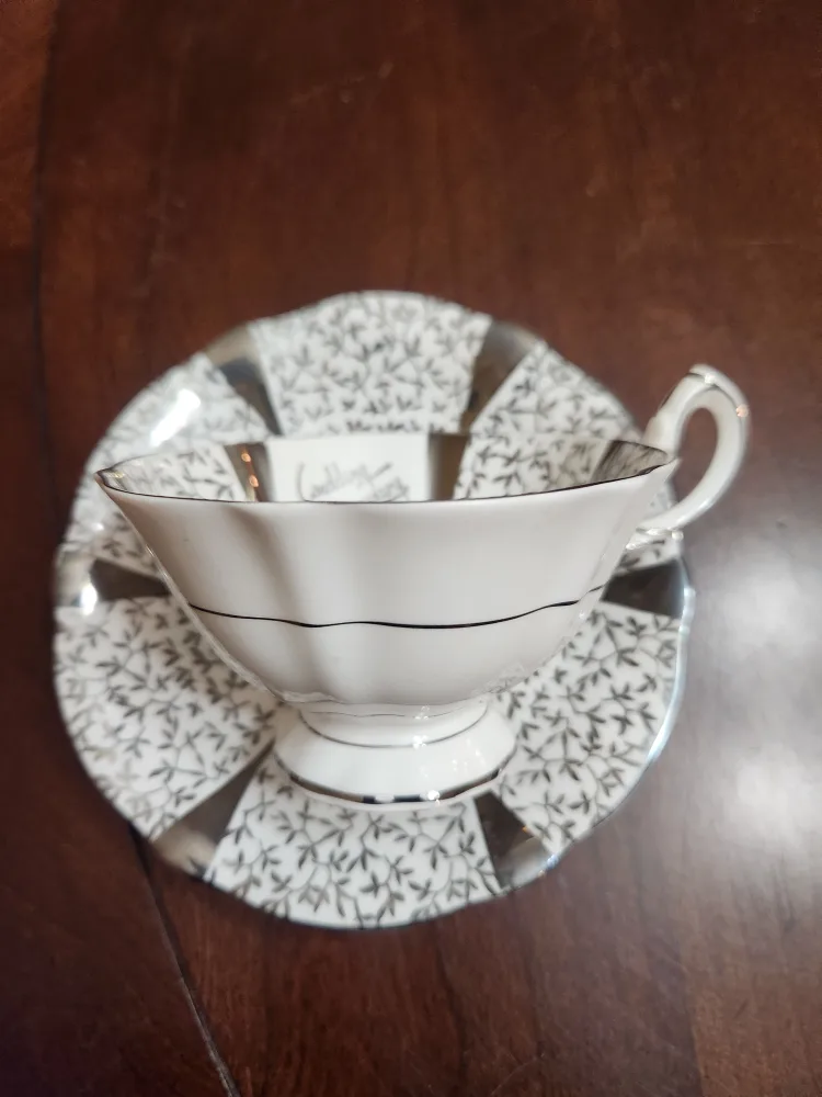 Vintage Queen Anne Silver Lace Teacup and Saucer image indicator(5)