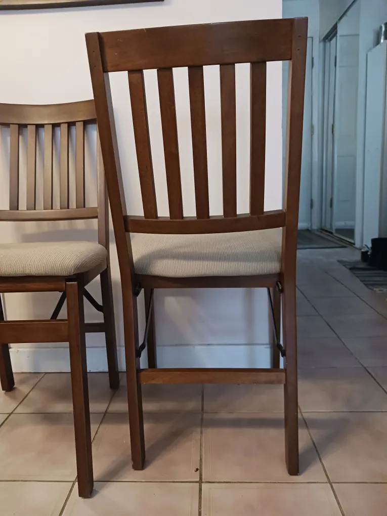 Pair of Folding Wooden Chairs with Beige Cushions image indicator(3)