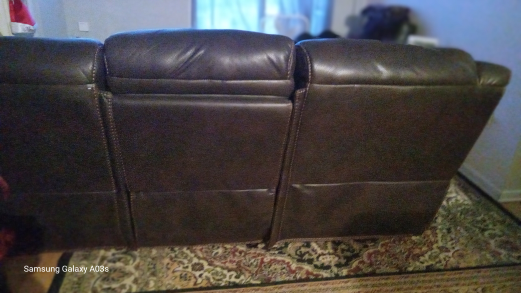 Brown Leather Reclining Sofa