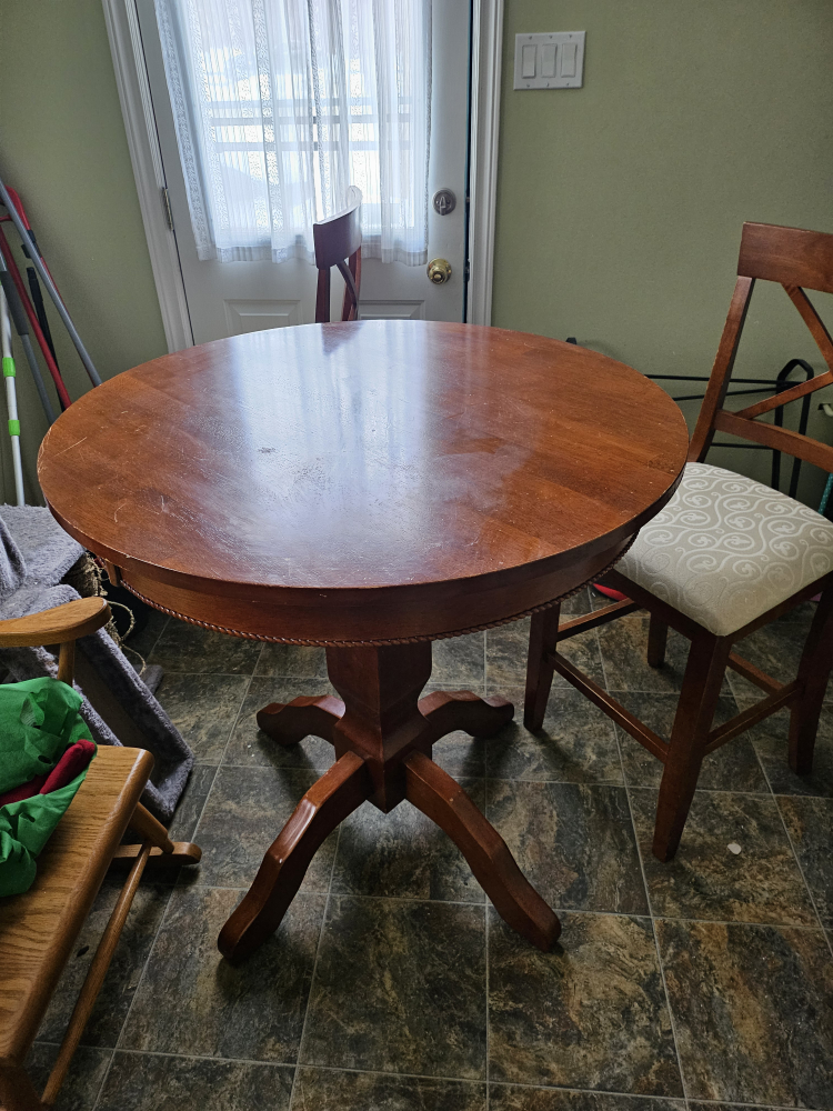 Round Wooden Dining Table with four Chairs
