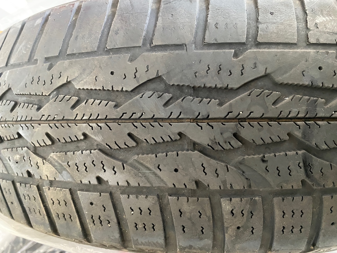lightly used Firestone Winterforce 215/60R16 Winter Tires - photo 2