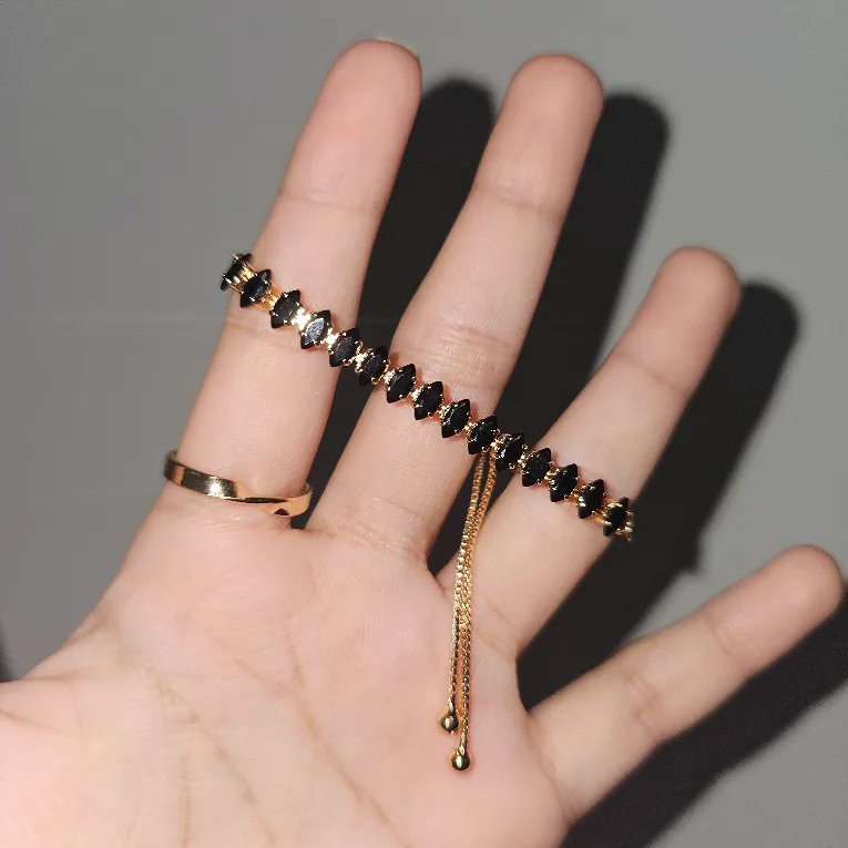 Black crystal bracelet, black pearl stud earrings, and ring set image indicator(2)