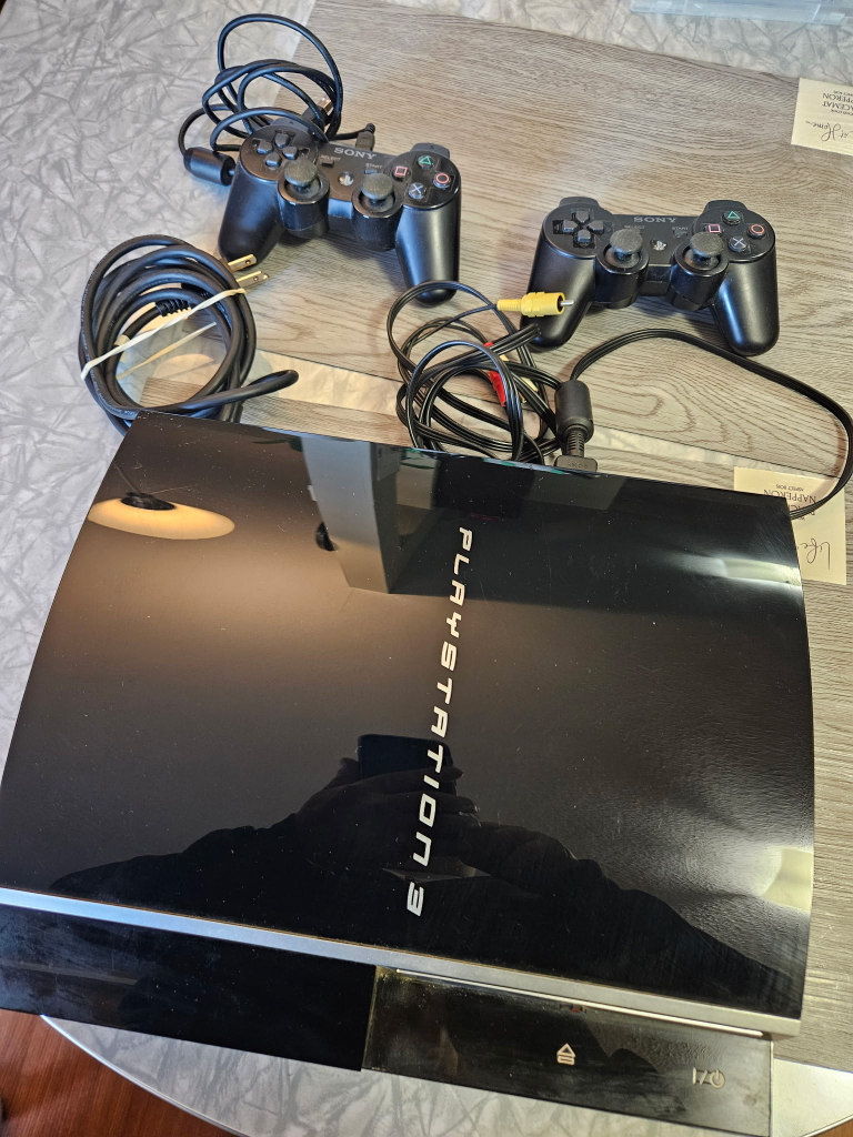 Sony PlayStation 3 Console with 2 Controllers