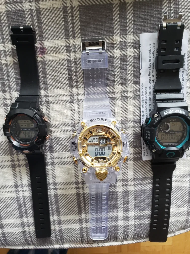 Three Sport Watches: Black, Gold, and Teal image indicator(2)