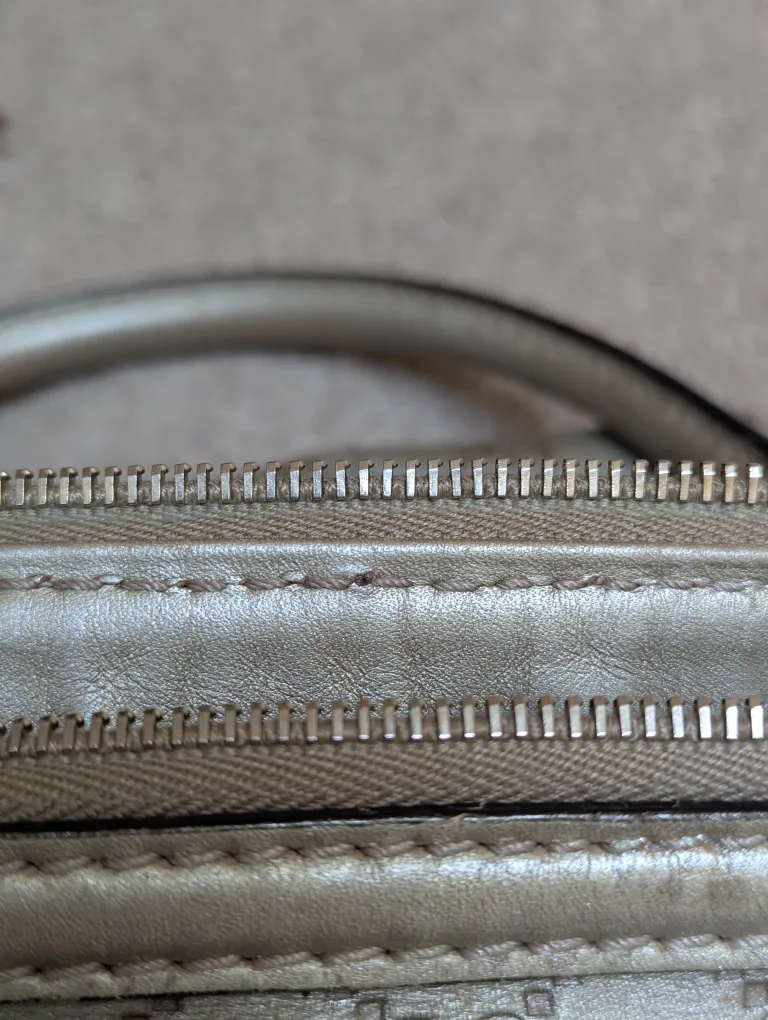 Authentic Gucci GG Monogram Metallic Gold Leather Handbag image indicator(10)