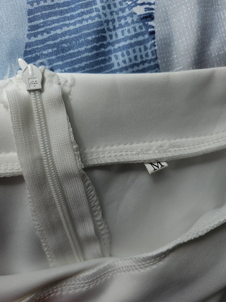 White Off-the-Shoulder Long-Sleeve Jumpsuit - Size M image indicator(2)