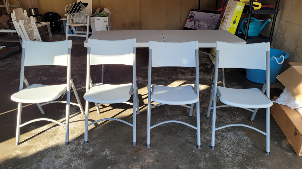Four Resin Folding Chairs