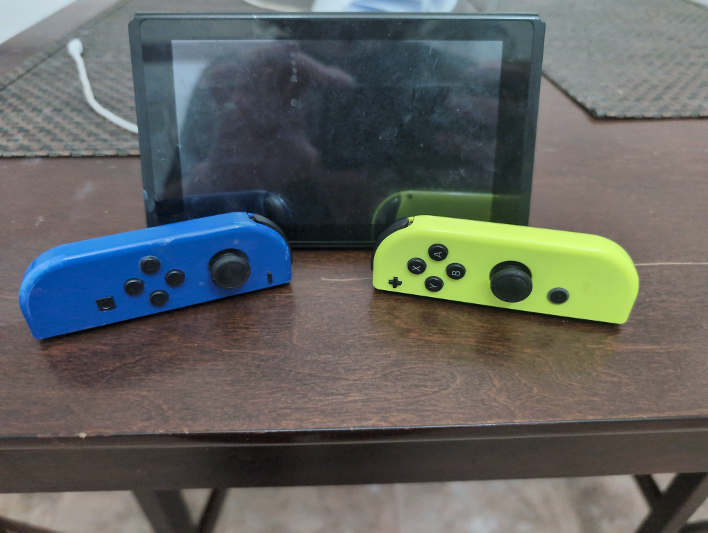 Nintendo Switch Console with Neon Blue and Yellow Joy-Cons - photo 2