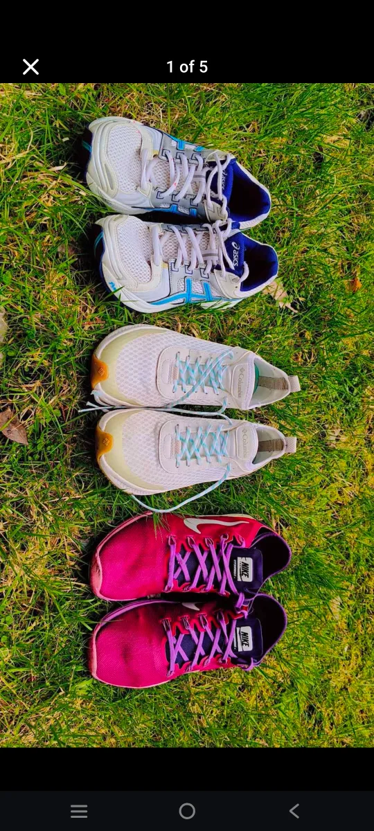 Three pairs of women's running shoes