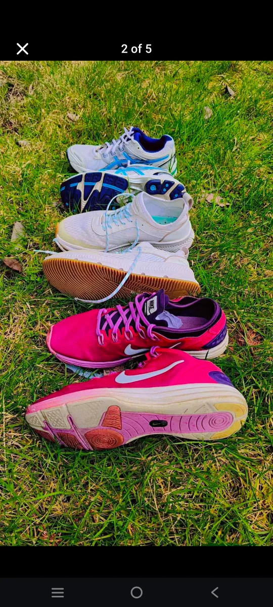 Three pairs of women's running shoes image indicator(2)