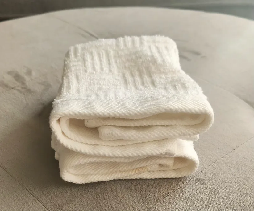 Trio of White Textured Washcloths image indicator(10)