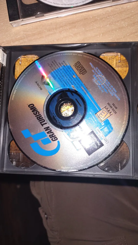 PlayStation One w/ controller and 4 games image indicator(5)