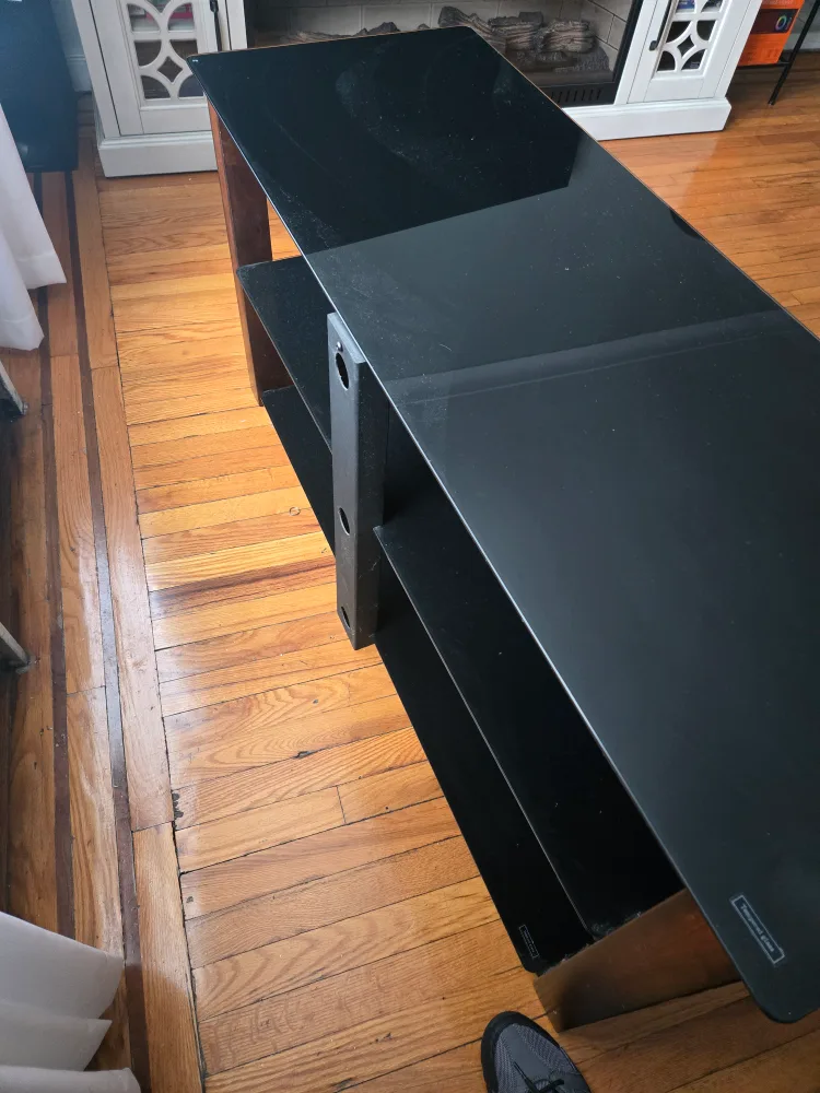 Black Glass TV Stand with Wood Accents image indicator(5)