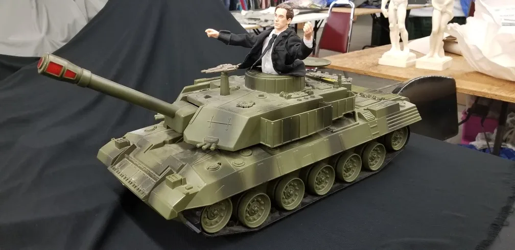 Business man riding a tank ( war is profitable  ) 1986 image indicator(2)