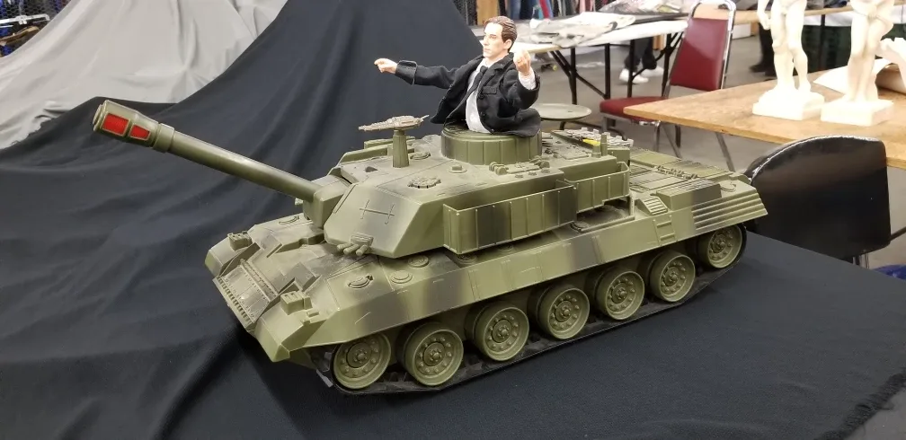 Business man riding a tank ( war is profitable  ) 1986 image indicator(4)