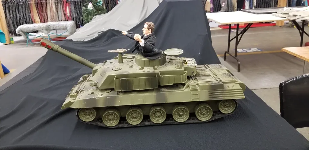 Business man riding a tank ( war is profitable  ) 1986 image indicator(5)